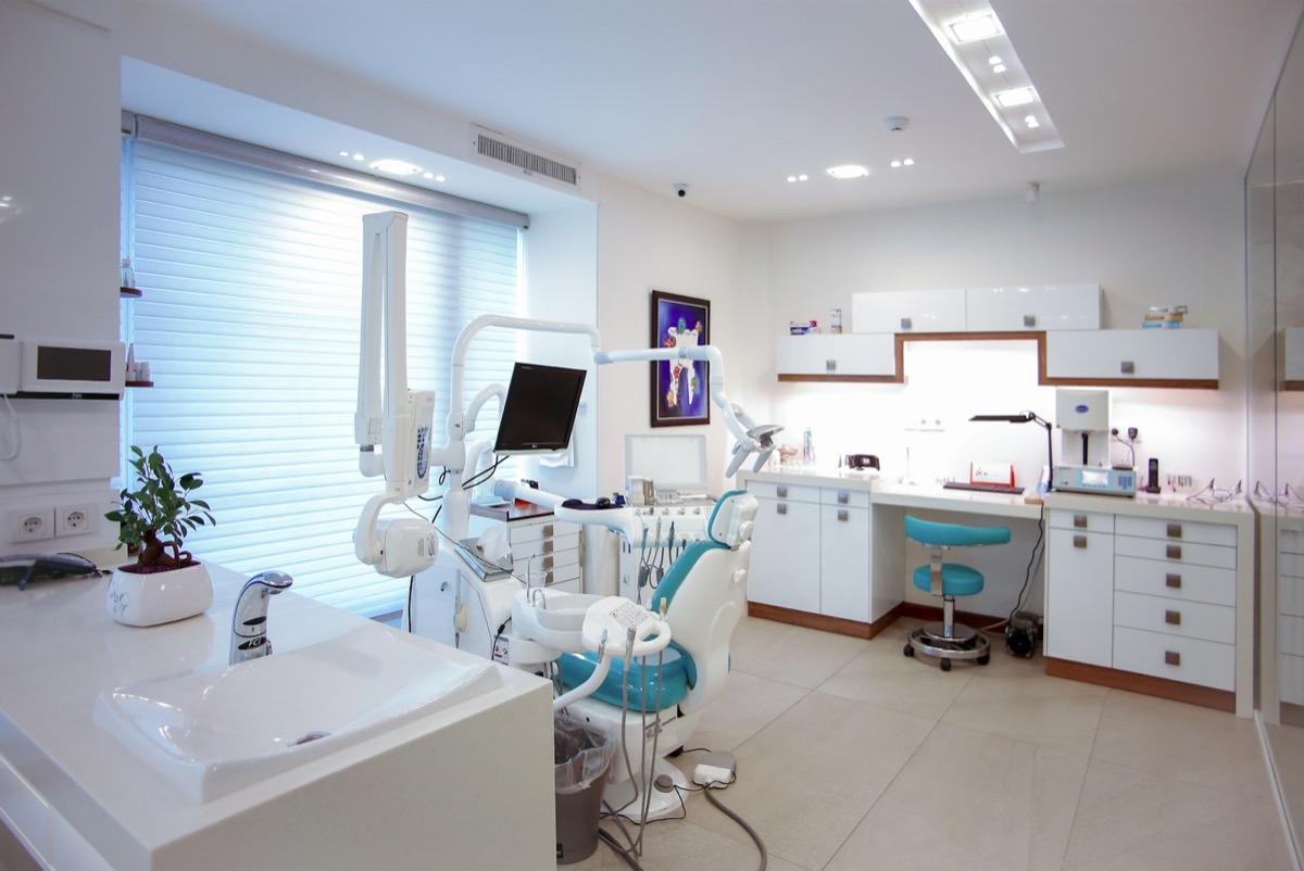 Modern dental clinic operatory with dental chair